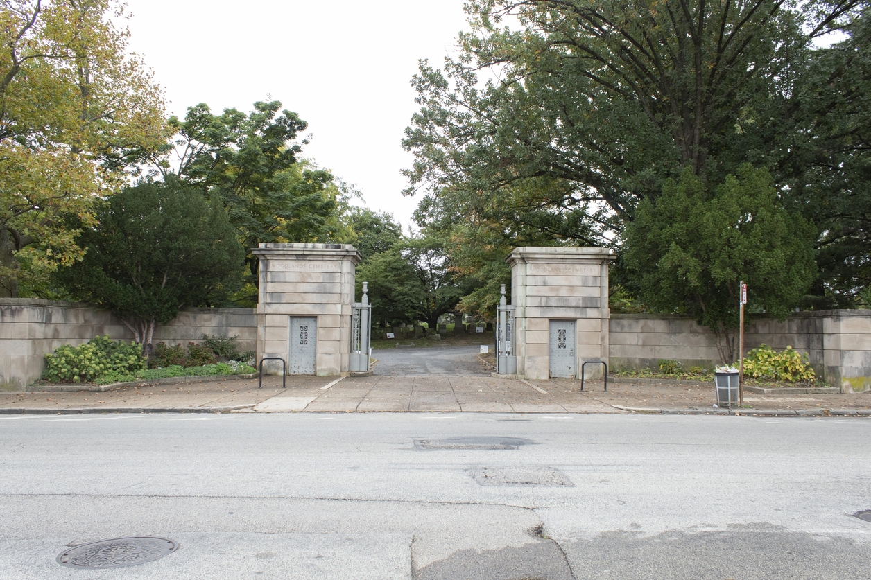 Stone towers forming gateway to cemetery