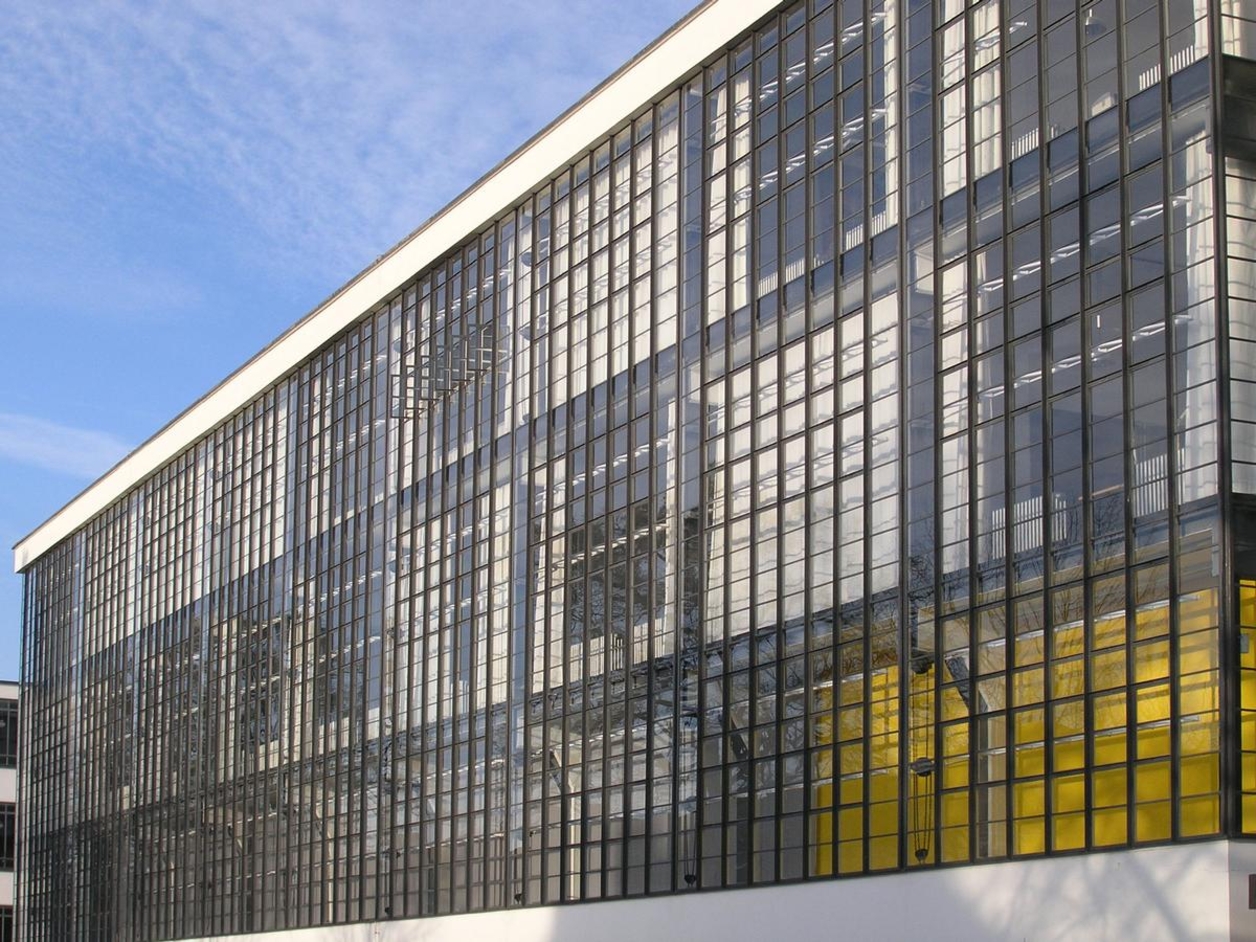 The iconic glass curtain wall at the Bauhaus Dessau.